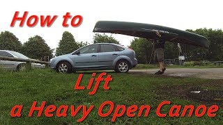 How to lift a heavy open canoe.