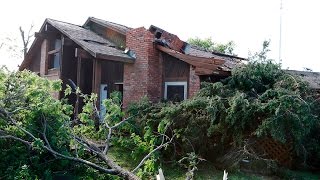 Sherman tornado: Couple hid in bathroom as there were trees 'coming through the roof'