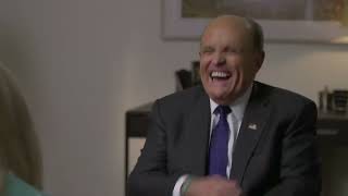 Trump aide says Giuliani groped her breasts