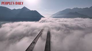 Soak in a spectacular scene of Longtan River Bridge engulfed by massive mist in China’s Hubei