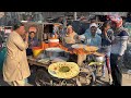 STREET CHEF COOKS SAAG MAKHAN &amp; ALOO PARATHA 😋 | AUTHENTIC LAHORE STREET FOOD