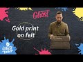 Gold printing on a felt briefcase using White Toner and Forever Flex-Soft