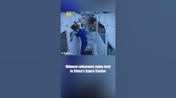 Chinese taikonauts enjoy food in China
