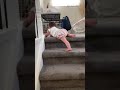10 months old baby descending (climbing down) stairs