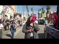 Hundreds of pro-Palestine protesters march outside the Oscars