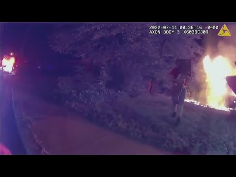 Body camera shows pizza delivery man save child from fire