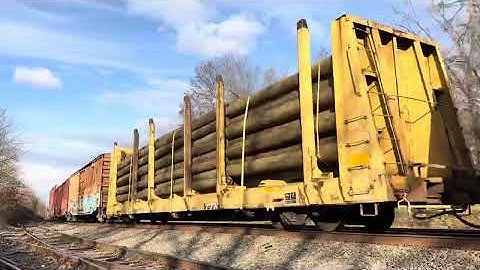 CSX 3309 ET44AH leads CSX M410 with a SD40-2 & CSX 1875 P&LE trailing at Piscataway 
