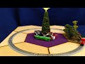 Kato's  Christmas Train, on a small Hex-TRAK circle.