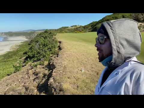 Caddy talk at Bandon Dunes golf trail.  Joe knows that ball is gone