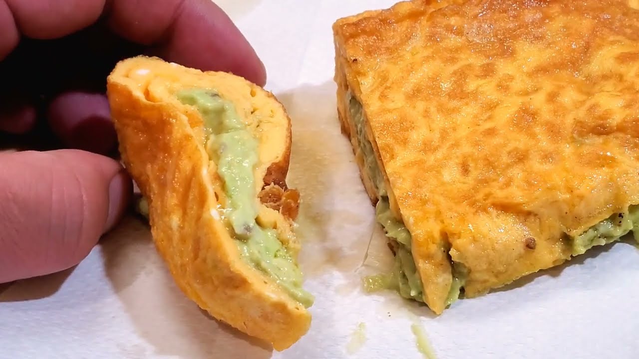 The avocado cream is delightfully enveloped in a sea of ​​egg