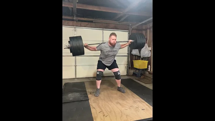 Herculean Man Does The Steinborn RockOver Squat wi...