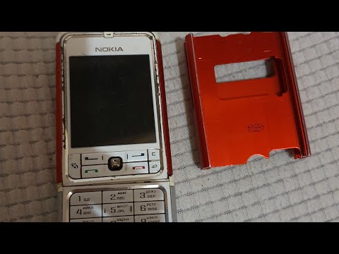 Video: Yuav Ua Li Cas Hloov Nokia 3250 Rooj Plaub