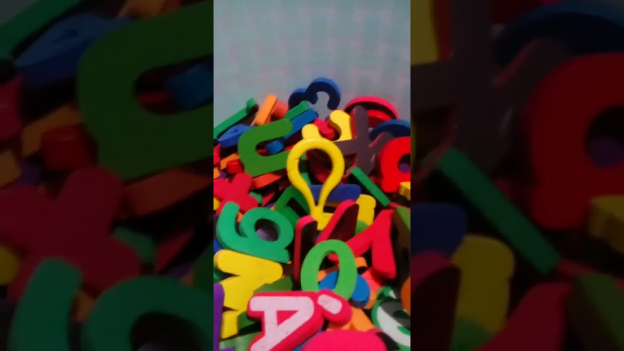 foam mag & wood letters mixed with old mags mag: magnets