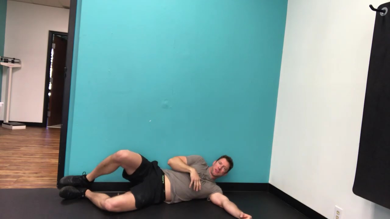 Side lying clamshells against wall youtube