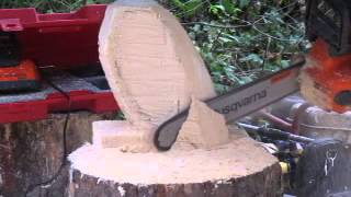 Carving an Owl 1 The first part of Robs chainsaw owl carving https://www.facebook.com/WoodsculptorKim?fref=ts.