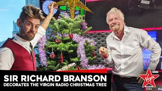 Sir Richard Branson decorates the Virgin Radio Dubai Christmas Tree