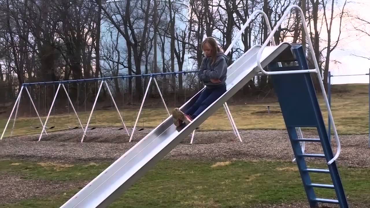 Girl Slowly Slides Down Squeaky Slide YouTube