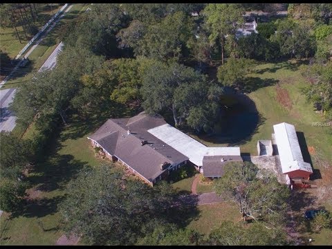 beaches sardinia Seller Finance Clearwater ranch home with 5 stabels - 2 acres in Clearwater (Pinellas County).