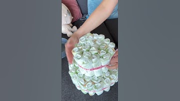 Easy diy diaper cake you can make at home for your pregnant love ones. #diy #diapercake #babyshower