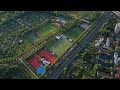 Frankfurt sports complex with soccer field and tennis courts near highway and residential area
