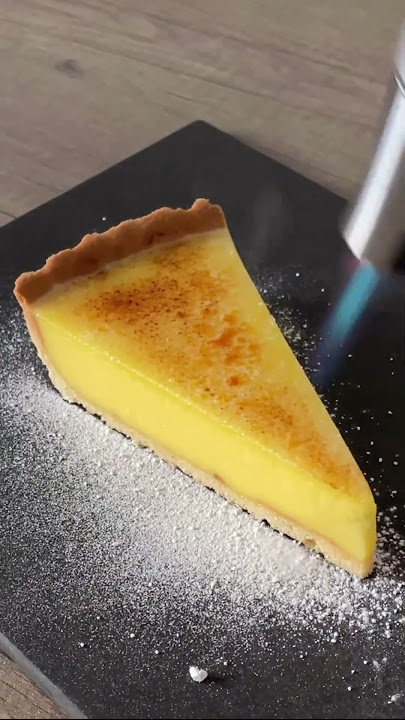 Lemon tart 🍋👅 baked until just set, brûléed the top w/ sugar, served with a dollop of crème fraîche