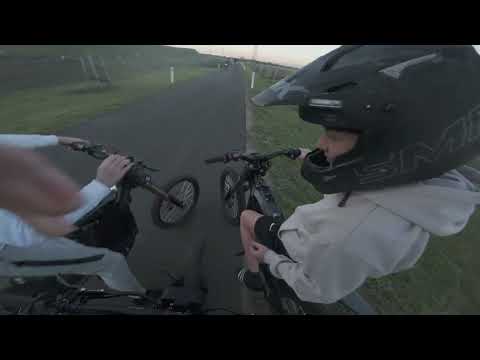 Surron sunset wheelies