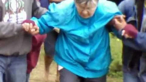 Yurok Tribe Elder Blanche Blankenship hiking up tr...