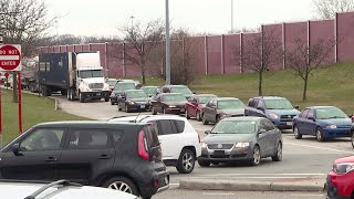 In the second day of drive-thru food pickup, line cars outside greater
cleveland bank backed up traffic tuesday.