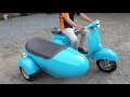 Vespa scooter piaggio with sidecar blue