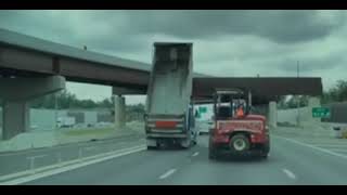 Dump Truck Hits Overpass In Virginia