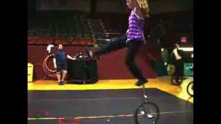 A Spinnng juggling ring on foot while