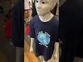 Person dressed as an alien walks around NYC mall