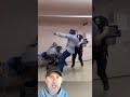 Man kicks a baby stroller with newborn baby inside of a courthouse.