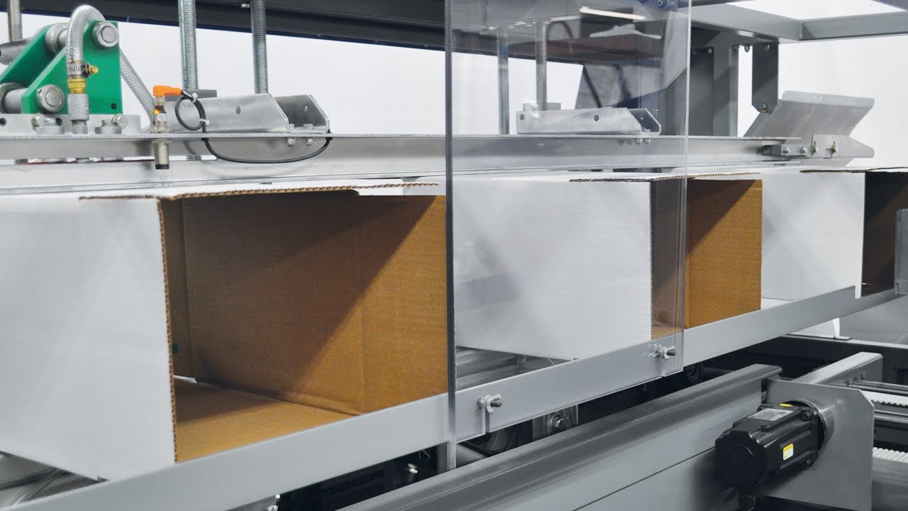 Adhesive sealing case erector- From A-B-C Packaging Machine