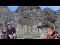 Nomadic family. Helping grandfather in building a house
