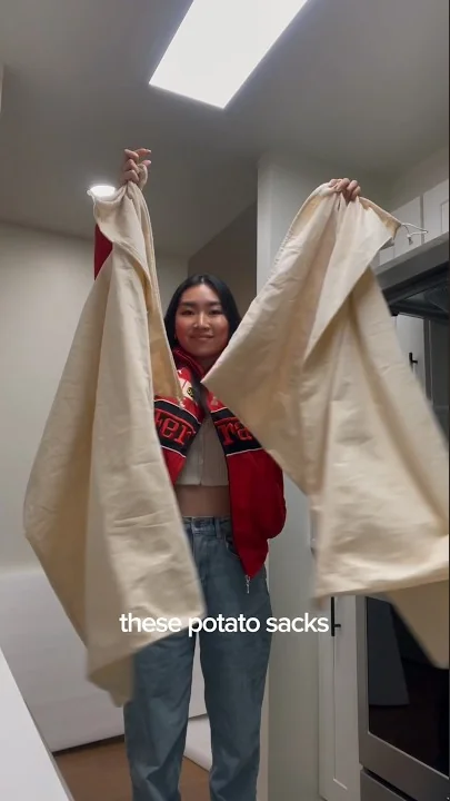 I sewed these potato sacks into the cutest shower curtains