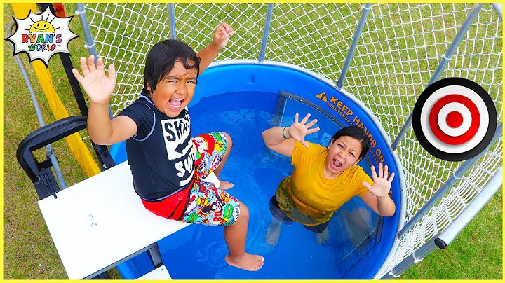 Ryan plays Dunk Tank Family Challenge with Daddy a...