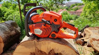 Husqvarna 565 (70.6cc 5HP) - first start, first cuts, muffler mod, big wood cut and more...