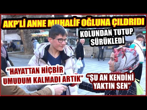 Röportajda AKP'yi savunan anne, muhalif oğlu konuşunca çıldırdı! Kolundan tutup sürükledi!