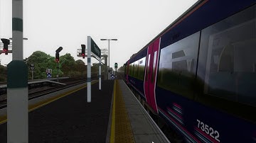 Class 377 in ex-FCC and Southern livery departs Three Bridges.