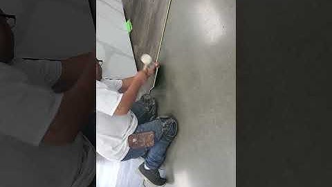 Use Flooring Piece As A Tapping Block