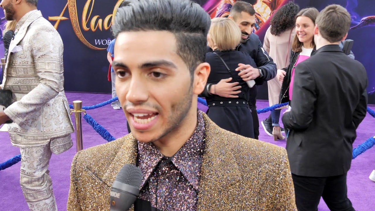 Aladdin Star Mena Massoud Charms Disneys Purple Carpet