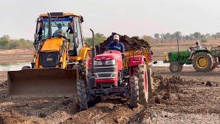 Mahindra and Kubota tractors working with loaded trolley | tractor |