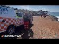 Terrifying cliff rescue of tourists trapped in Australia