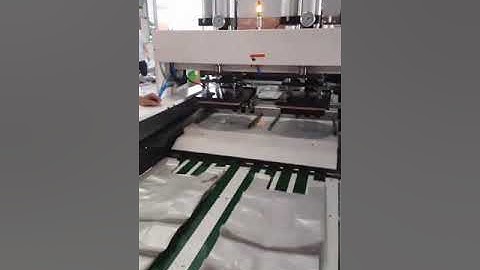 Máy cắt nóng và dập quai tự động !