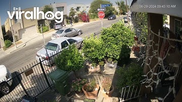 Vehicle Collision Caught on Security Camera || ViralHog