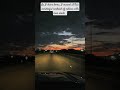 As I drive home, I gaze in awe at the amazing RED SUNSET,   casting a warm glow over the city lights