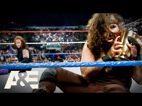 Undertaker & Mankind's DEATH-DEFYING Buried Alive Match | WWE Rivals | A&E