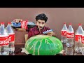 BIG COCA COLA BALLOON VS MENTOS