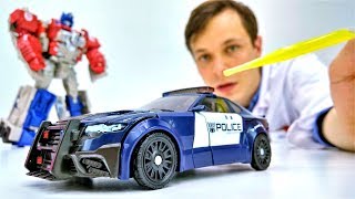 Игры с доктор Ой - Трансформеры Оптимус и полицейские машинки Игры с доктор Ой - Трансформеры Оптимус и полицейские машинки